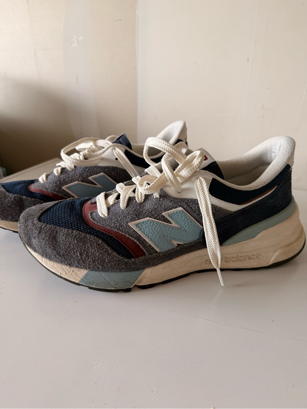 New Balance Gray Navy Light Blue Accent Casual Sneakers